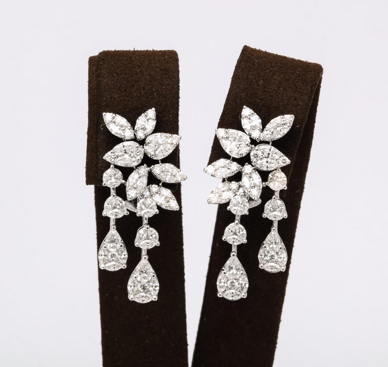 https://a.1stdibscdn.com/diamond-cluster-dangle-earring-for-sale-picture-3/j_415/j_160698521655143269720/6R1A1388_master.jpg?width=768