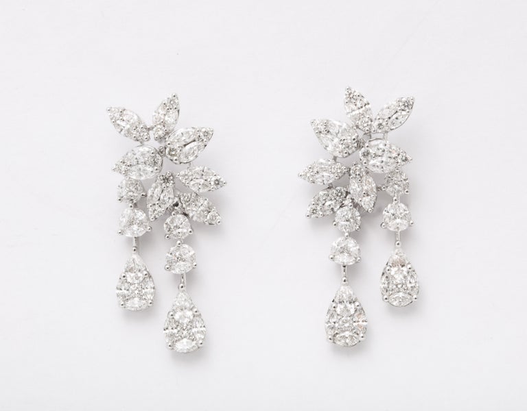 https://a.1stdibscdn.com/diamond-cluster-dangle-earring-for-sale-picture-7/j_415/j_160698521655143269510/6R1A1380_master.jpg?width=768