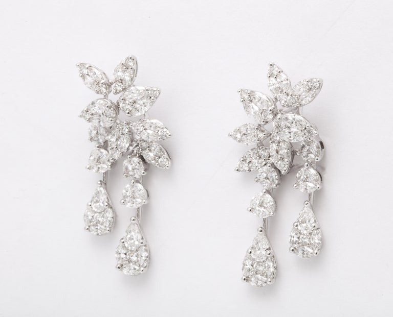 https://a.1stdibscdn.com/diamond-cluster-dangle-earring-for-sale-picture-9/j_415/j_160698521655143269320/6R1A1383_master.jpg?width=768