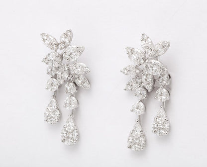 https://a.1stdibscdn.com/diamond-cluster-dangle-earring-for-sale-picture-9/j_415/j_160698521655143269320/6R1A1383_master.jpg?width=768