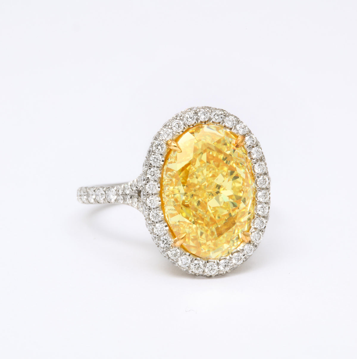 https://a.1stdibscdn.com/gia-certified-6-carat-oval-fancy-yellow-diamond-ring-for-sale-picture-3/j_415/j_129688521628091736312/6R1A2494_master.jpg