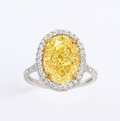 GIA Certified 5.05 Carat Oval Fancy Yellow Diamond Platinum Ring