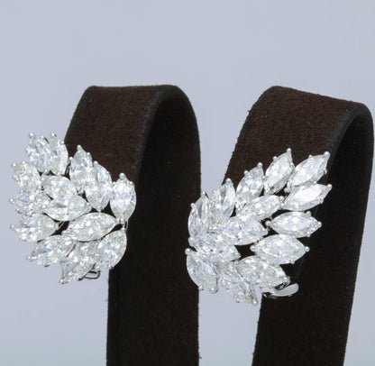 https://a.1stdibscdn.com/diamond-cluster-earrings-for-sale-picture-5/archivesE/upload/0/j_41520831523637148734/6R1A2650_master.jpg?width=768
