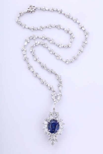 https://a.1stdibscdn.com/vivid-blue-ceylon-sapphire-and-diamond-pendant-necklace-for-sale-picture-3/0/j_56032021544653090604/6R1A3347_master.jpg