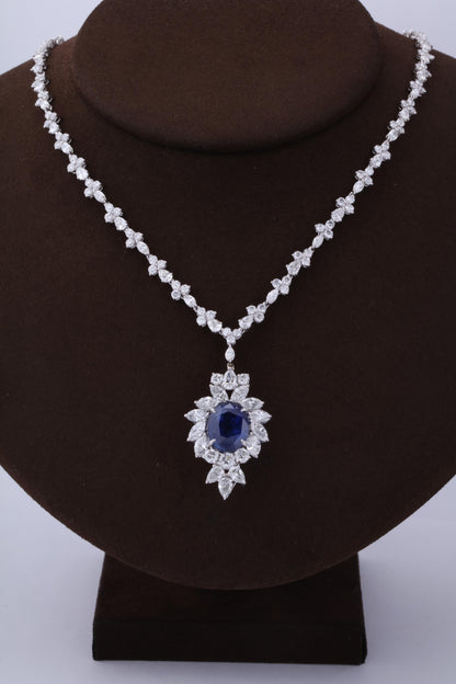 https://a.1stdibscdn.com/vivid-blue-ceylon-sapphire-and-diamond-pendant-necklace-for-sale-picture-5/0/j_56032021544653094354/6R1A3353_master.jpg