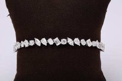 https://a.1stdibscdn.com/multi-shape-diamond-tennis-bracelet-for-sale-picture-7/366869/j_57882221553111360670/6R1A3407_org_master.jpg