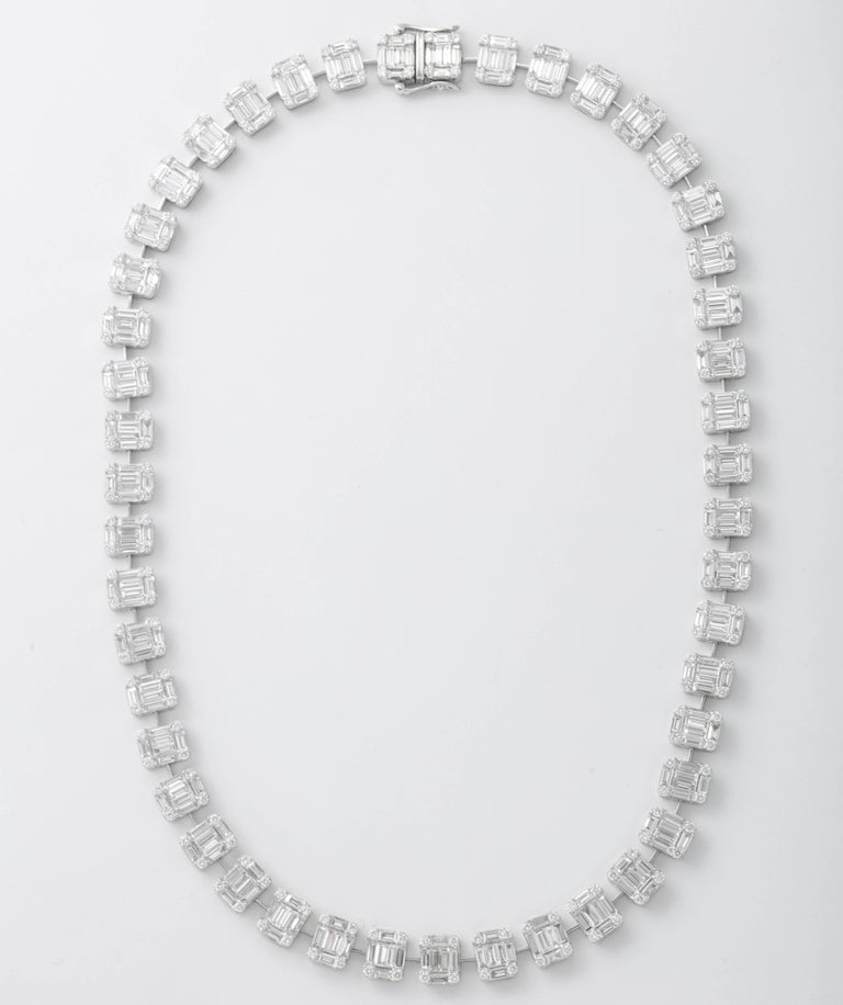 https://a.1stdibscdn.com/emerald-cut-diamond-necklace-illusion-set-for-sale-picture-5/j_415/j_99658421595349090047/6R1A3838_master.jpg?width=768