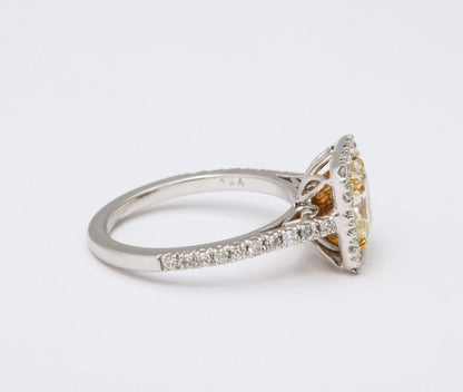 GIA Certified 1.71 Carat Yellow Diamond Cushion Cut Platinum Ring