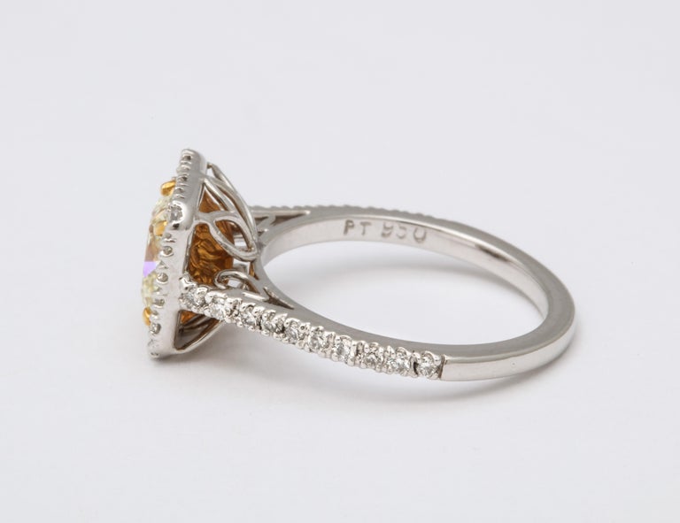 GIA Certified 1.71 Carat Yellow Diamond Cushion Cut Platinum Ring