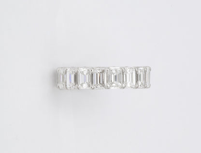 Exquisite 7.82 Carat Emerald Cut Diamond Platinum Eternity Band Ring