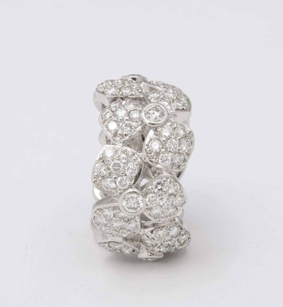 https://a.1stdibscdn.com/wide-diamond-flower-band-for-sale-picture-2/j_415/j_133715621632146837037/6R1A4962_master.jpg
