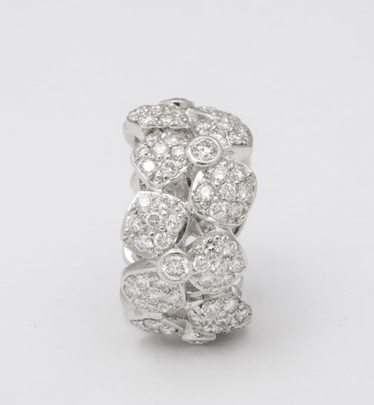 https://a.1stdibscdn.com/wide-diamond-flower-band-for-sale-picture-6/j_415/j_133715621632146839975/6R1A4959_master.jpg