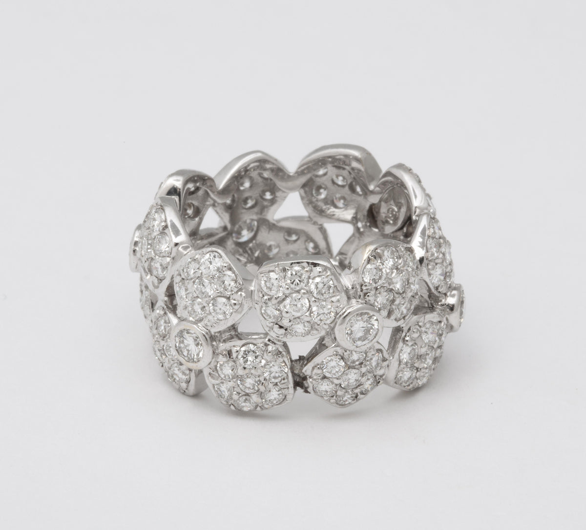 https://a.1stdibscdn.com/wide-diamond-flower-band-for-sale-picture-5/j_415/j_133715621632146836935/6R1A4958_master.jpg