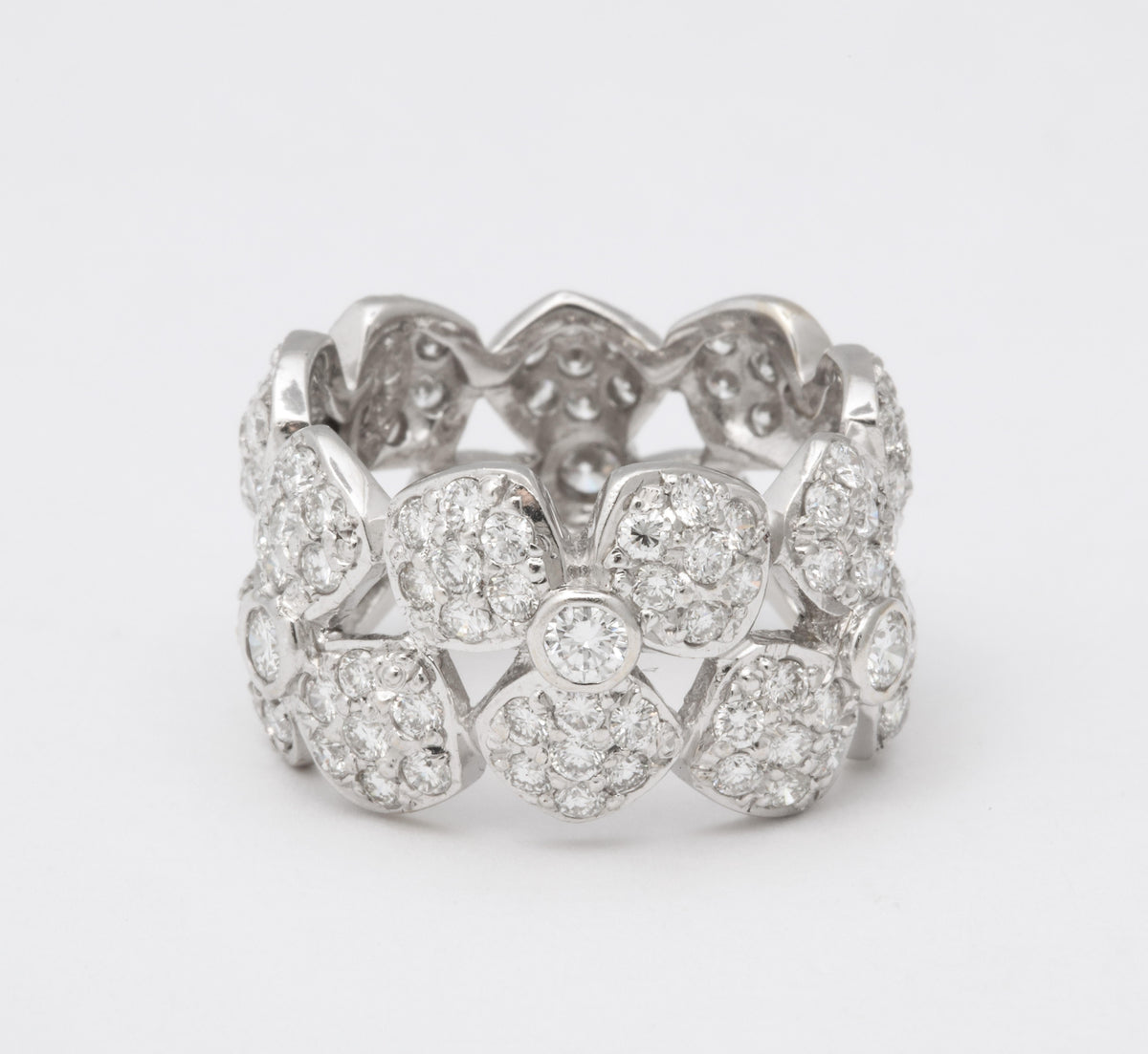https://a.1stdibscdn.com/wide-diamond-flower-band-for-sale-picture-8/j_415/j_133715621632146836898/6R1A4961_master.jpg