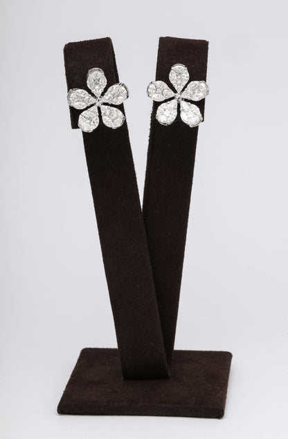 https://a.1stdibscdn.com/diamond-flower-earrings-for-sale-picture-3/j_415/1575403216198/6R1A5026_master.jpg?width=768