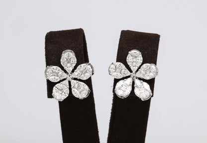 https://a.1stdibscdn.com/diamond-flower-earrings-for-sale-picture-5/j_415/1575403223556/6R1A5028_master.jpg?width=768