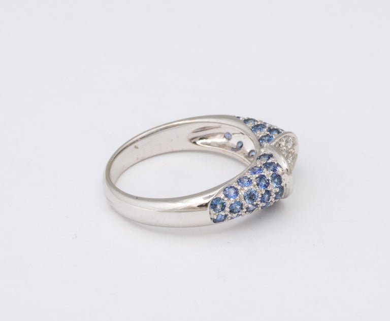 https://a.1stdibscdn.com/blue-sapphire-and-diamond-heart-ring-for-sale-picture-5/j_415/j_133715121632146559651/6R1A5039_master.jpg?width=768