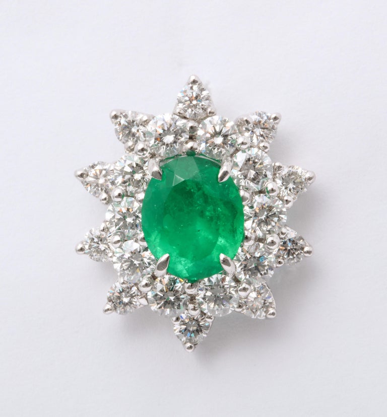https://a.1stdibscdn.com/emerald-and-diamond-earrings-for-sale-picture-7/j_415/1575403457084/6R1A5054_master.jpg?width=768