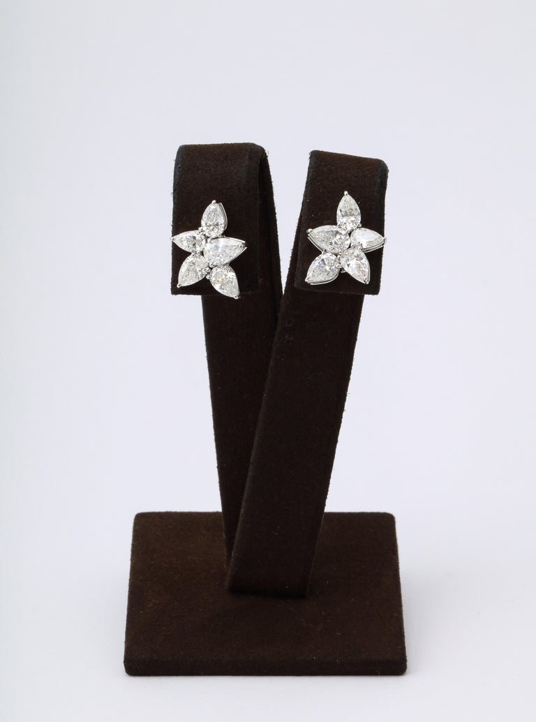https://a.1stdibscdn.com/cluster-diamond-earrings-for-sale-picture-3/j_415/j_167933421661437836789/6R1A5076_master.jpg?width=768