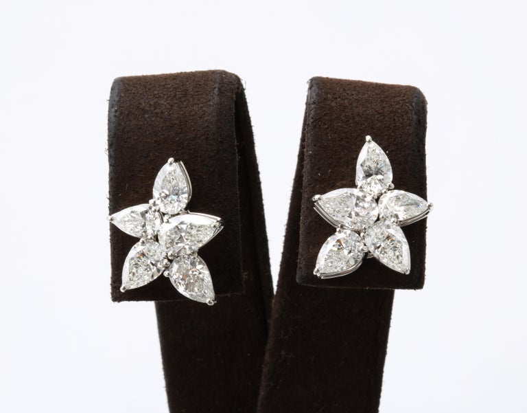 https://a.1stdibscdn.com/cluster-diamond-earrings-for-sale-picture-5/j_415/j_167933421661437836744/6R1A5079_master.jpg?width=768