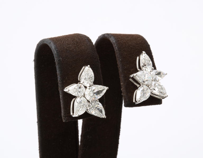 https://a.1stdibscdn.com/cluster-diamond-earrings-for-sale-picture-7/j_415/j_167933421661437836743/6R1A5081_master.jpg?width=768