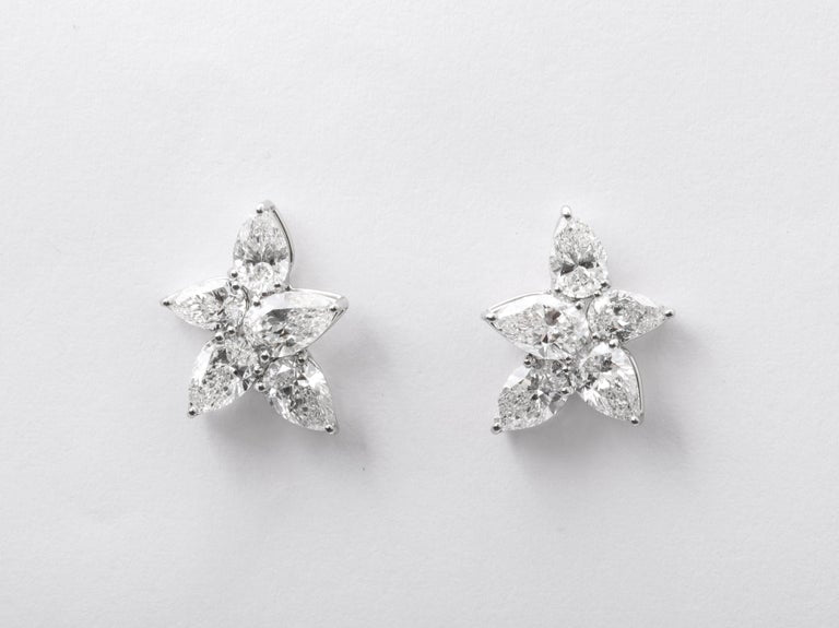 https://a.1stdibscdn.com/cluster-diamond-earrings-for-sale-picture-9/j_415/j_167933421661437842602/6R1A5086_master.jpg?width=768