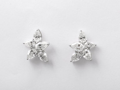 https://a.1stdibscdn.com/cluster-diamond-earrings-for-sale-picture-9/j_415/j_167933421661437842602/6R1A5086_master.jpg?width=768