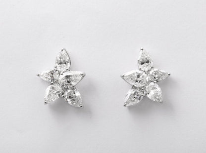 Exquisite 5.01 Carat Pear Shape Diamond Cluster Platinum Stud Earrings