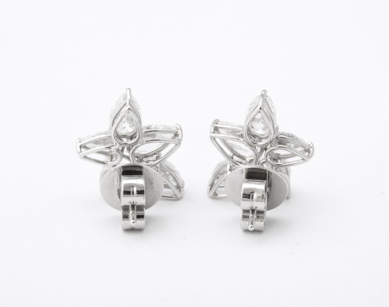 Exquisite 5.01 Carat Pear Shape Diamond Cluster Platinum Stud Earrings