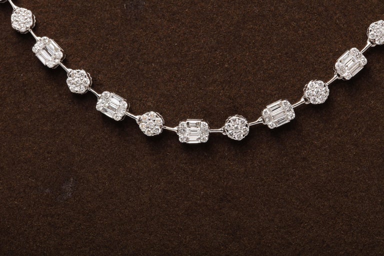 https://a.1stdibscdn.com/round-and-emerald-cut-diamond-illusion-set-necklace-for-sale-picture-8/j_415/j_164752621658414304963/6R1A5113_master.jpg?width=768