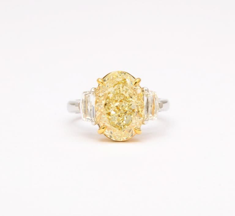 https://a.1stdibscdn.com/6-carat-oval-yellow-diamond-ring-gia-certified-for-sale-picture-5/j_415/j_180650221672242089879/6R1A5233_master.jpg