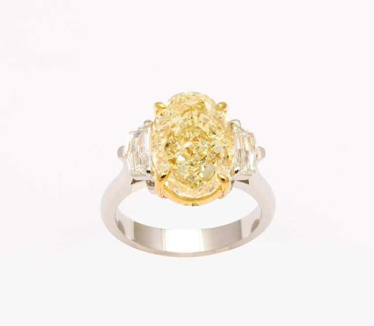 https://a.1stdibscdn.com/6-carat-oval-yellow-diamond-ring-gia-certified-for-sale-picture-9/j_415/j_180650221673294905313/6FECC03F_4A43_4E7D_96A0_2FDBC087F38E_master.jpeg