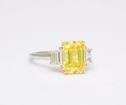 https://a.1stdibscdn.com/fancy-vivid-yellow-emerald-cut-ring-for-sale-picture-7/j_415/j_174482921667400163344/6R1A5485_master.jpg?width=768
