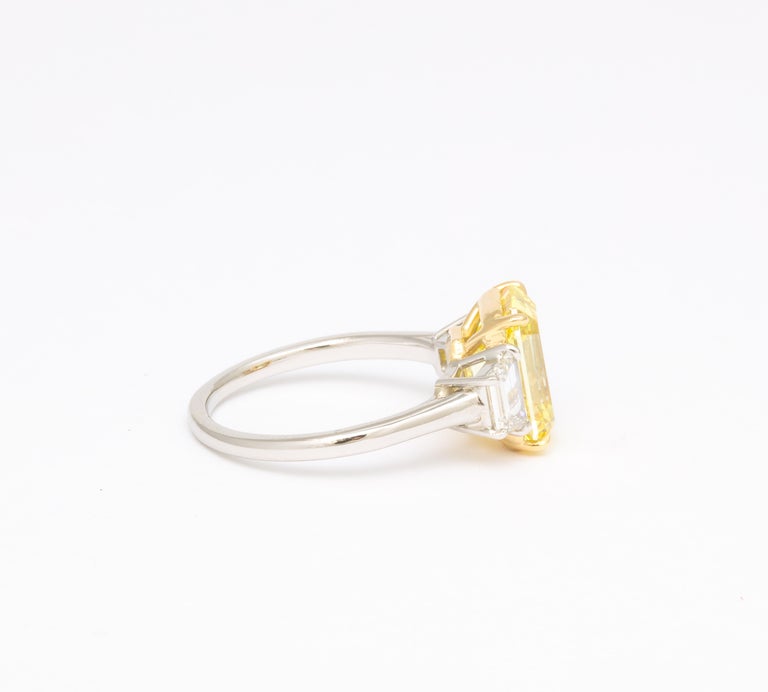 https://a.1stdibscdn.com/fancy-vivid-yellow-emerald-cut-ring-for-sale-picture-9/j_415/j_174482921667400158939/6R1A5488_master.jpg?width=768