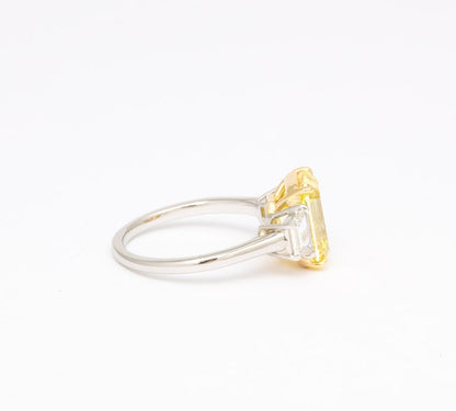 https://a.1stdibscdn.com/fancy-vivid-yellow-emerald-cut-ring-for-sale-picture-9/j_415/j_174482921667400158939/6R1A5488_master.jpg?width=768