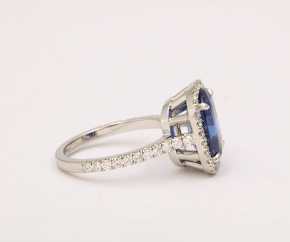 https://a.1stdibscdn.com/cushion-cut-blue-sapphire-and-diamond-halo-ring-for-sale-picture-9/j_415/j_194450021685541117216/6R1A5491_master.jpg