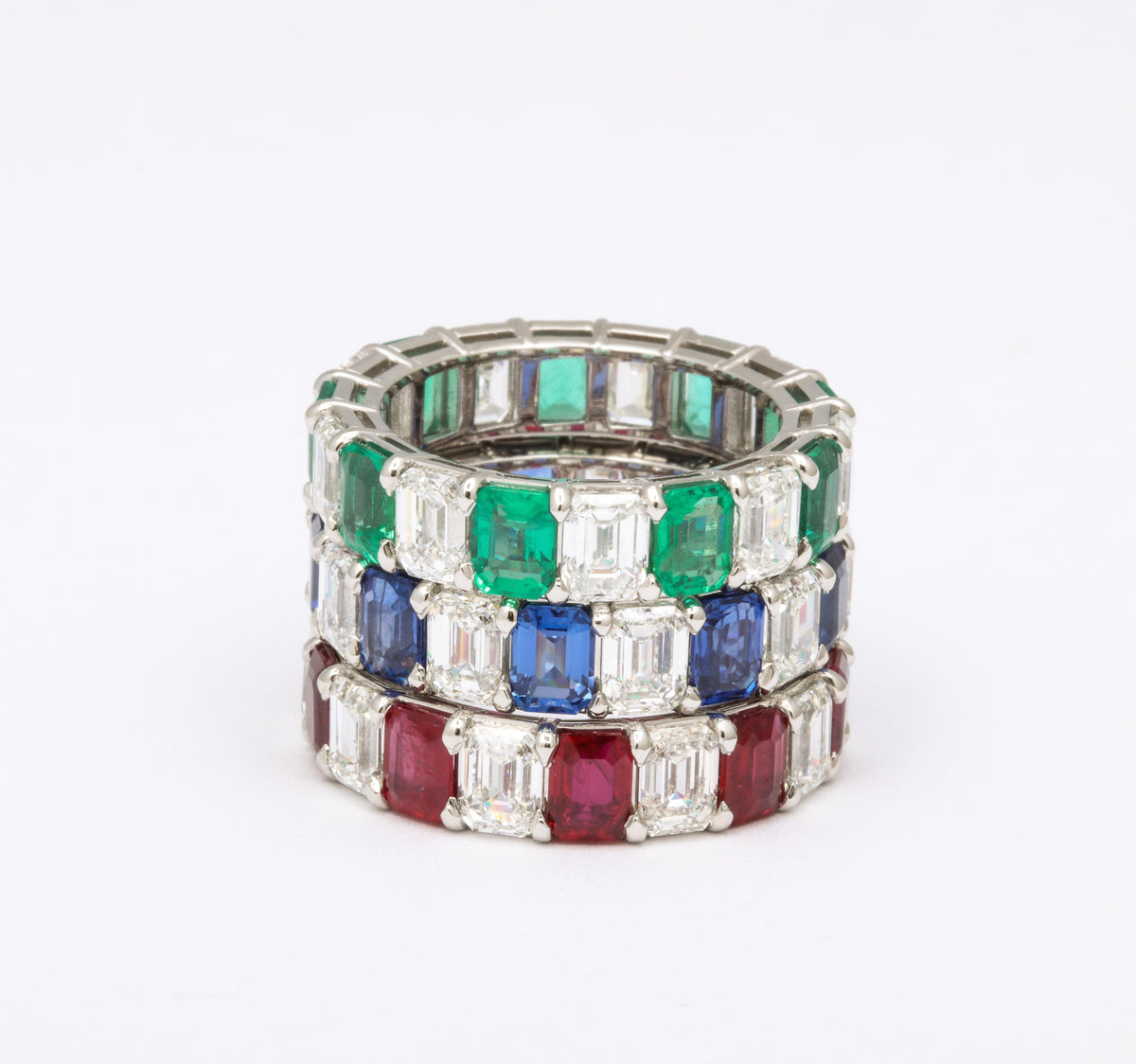 https://a.1stdibscdn.com/emerald-ruby-and-sapphire-emerald-cut-diamond-eternity-bands-for-sale-picture-4/j_415/j_174383521667319185903/6R1A5497_master.jpg