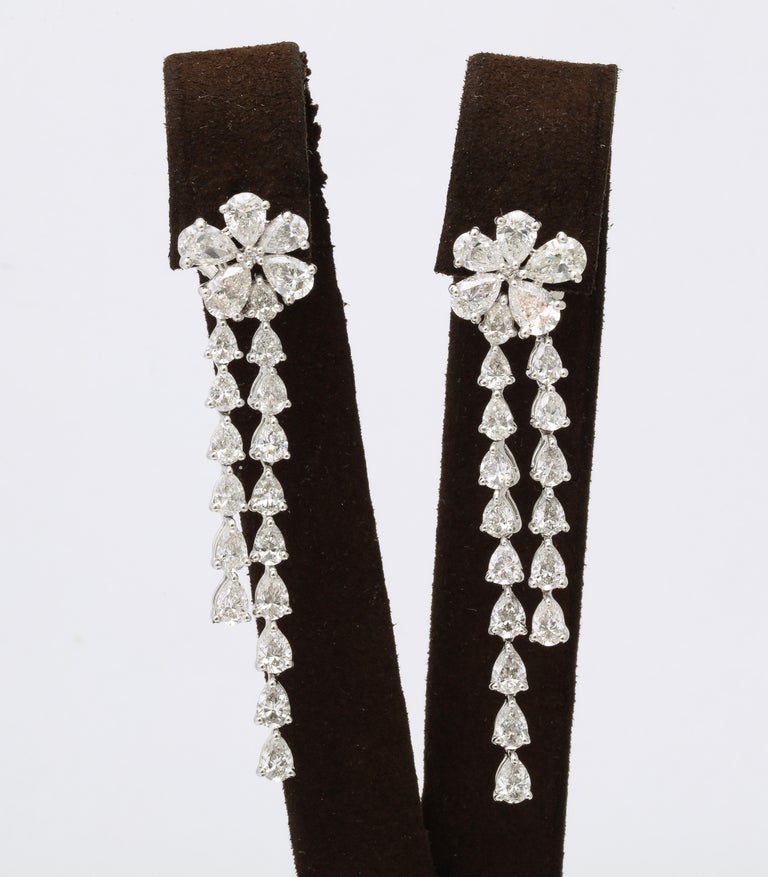 https://a.1stdibscdn.com/diamond-flower-drop-earring-for-sale-picture-13/j_415/j_17521622/FB1A1455_6799_468C_B13C_1669134922352_master.jpeg?width=768