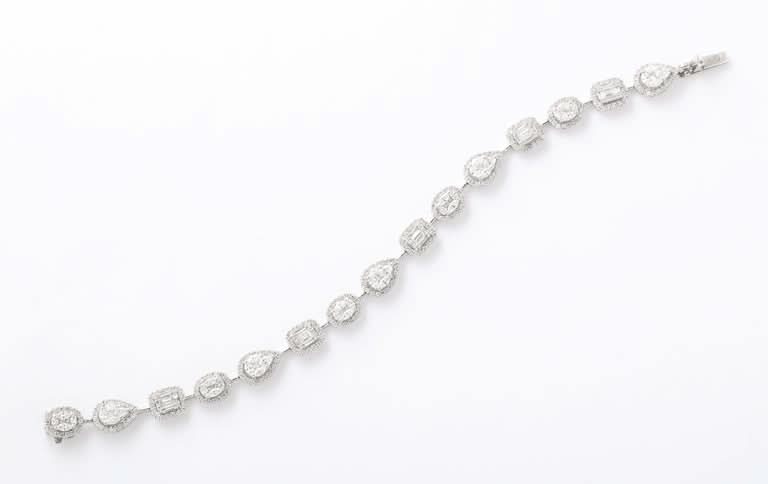Elegant Multi Shape Diamond Illusion Tennis Bracelet 18k White Gold