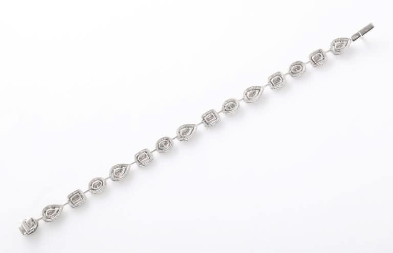 Elegant Multi Shape Diamond Illusion Tennis Bracelet 18k White Gold