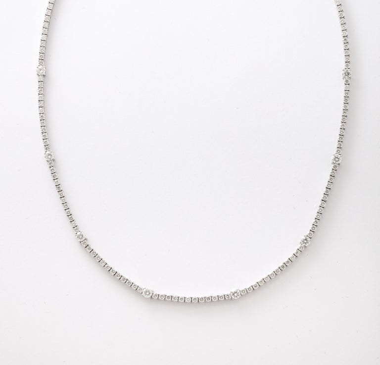 https://a.1stdibscdn.com/diamond-tennis-necklace-for-sale-picture-9/j_415/j_166501421659967982476/6R1A6031_master.jpg?width=768
