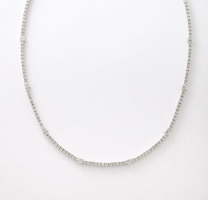 https://a.1stdibscdn.com/diamond-tennis-necklace-for-sale-picture-9/j_415/j_166501421659967982476/6R1A6031_master.jpg?width=768