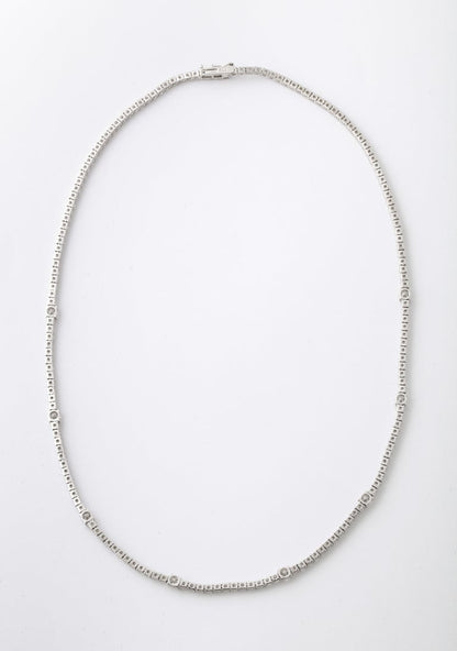 https://a.1stdibscdn.com/diamond-tennis-necklace-for-sale-picture-3/j_415/j_166501421659967982979/6R1A6033_master.jpg?width=768
