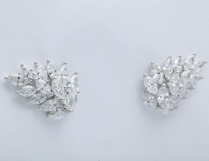 https://a.1stdibscdn.com/diamond-cluster-earring-cuffs-for-sale-picture-5/16156351/j_67519111559204005136/1_main-5_master.jpg?width=768