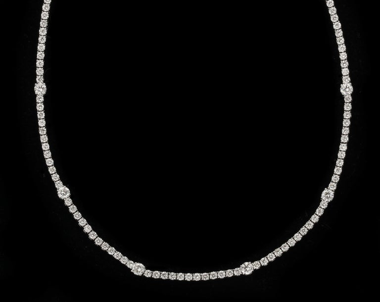 https://a.1stdibscdn.com/diamond-tennis-necklace-for-sale-picture-5/j_415/j_166501421659967983240/6R1A6026_master.jpg?width=768