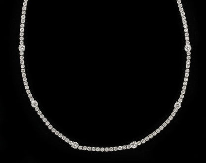 https://a.1stdibscdn.com/diamond-tennis-necklace-for-sale-picture-5/j_415/j_166501421659967983240/6R1A6026_master.jpg?width=768