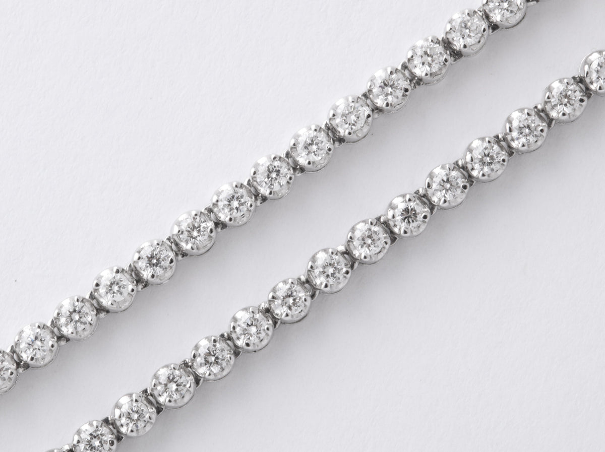 https://a.1stdibscdn.com/long-diamond-tennis-necklace-with-diamond-motifs-for-sale-picture-8/j_415/1565205390809/6R1A6037_master.jpg