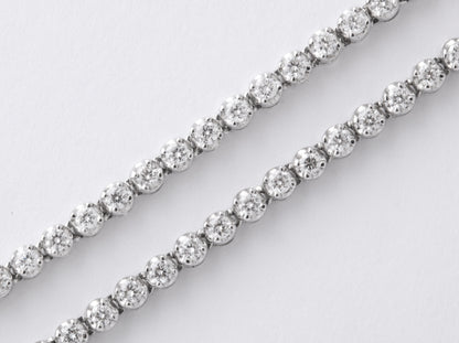 https://a.1stdibscdn.com/long-diamond-tennis-necklace-with-diamond-motifs-for-sale-picture-8/j_415/1565205390809/6R1A6037_master.jpg