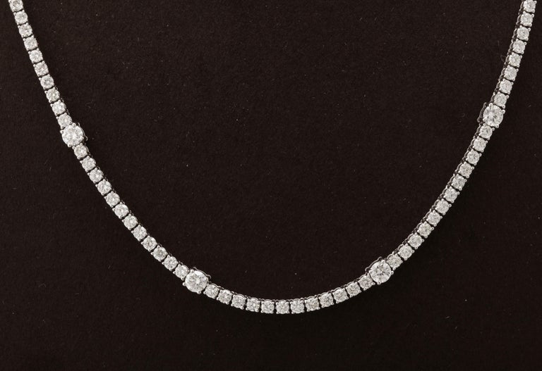https://a.1stdibscdn.com/diamond-tennis-necklace-for-sale-picture-3/j_415/j_166501421659967982979/6R1A6033_master.jpg?width=768