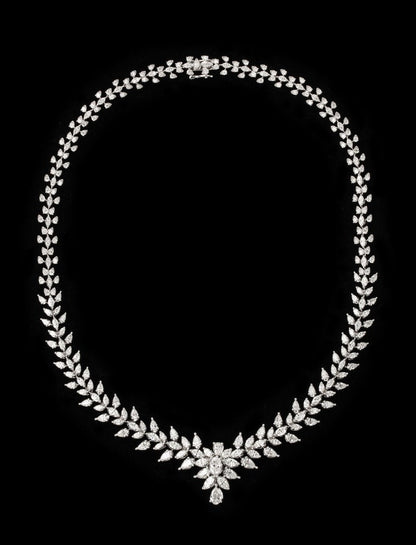https://a.1stdibscdn.com/diamond-necklace-for-sale/j_415/j_165036021658772084645/j_16503602_1658772085842_bg_processed.jpg?width=768